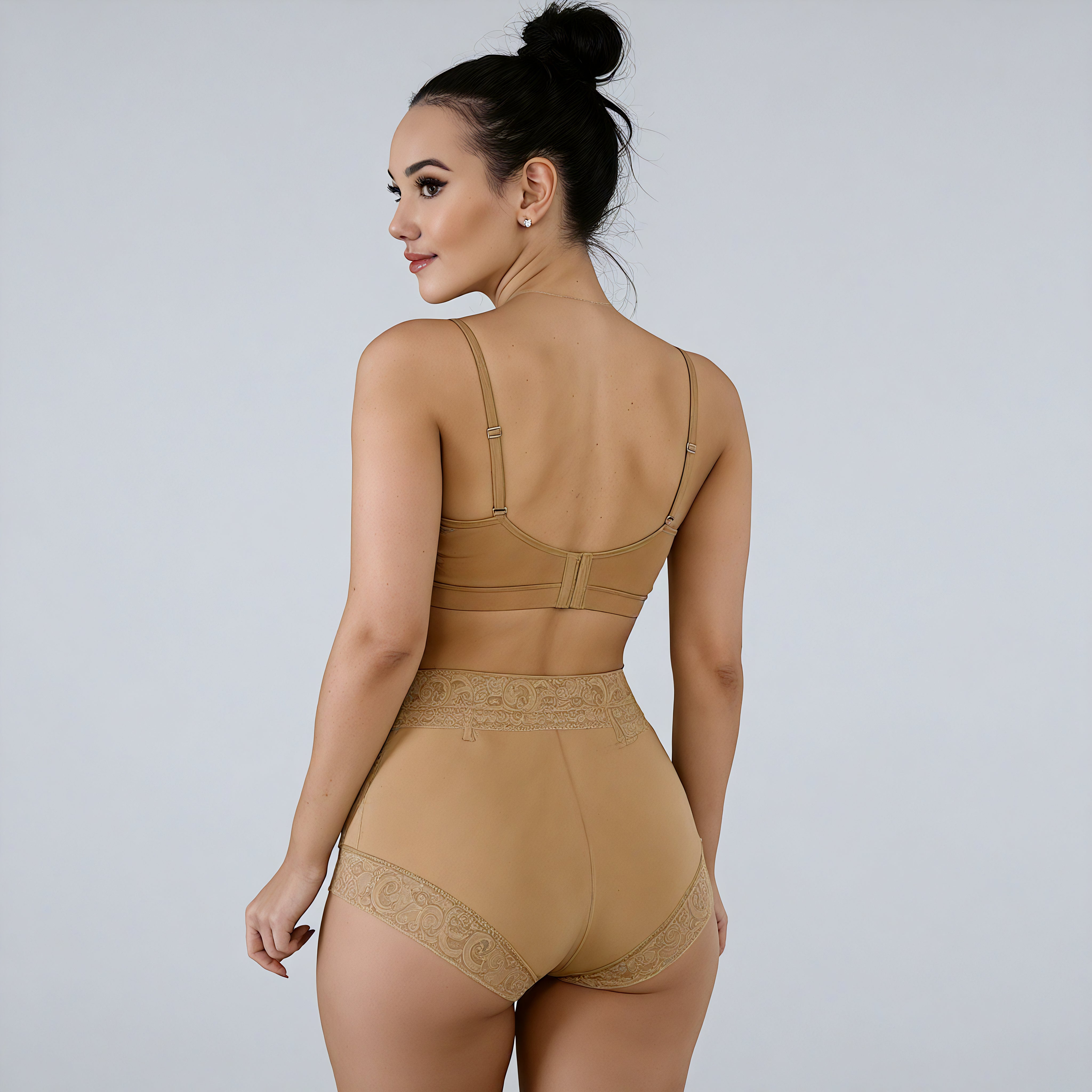 Woman wearing a beige shapewear bodysuit on a plain background shapewear lyvia bottoms